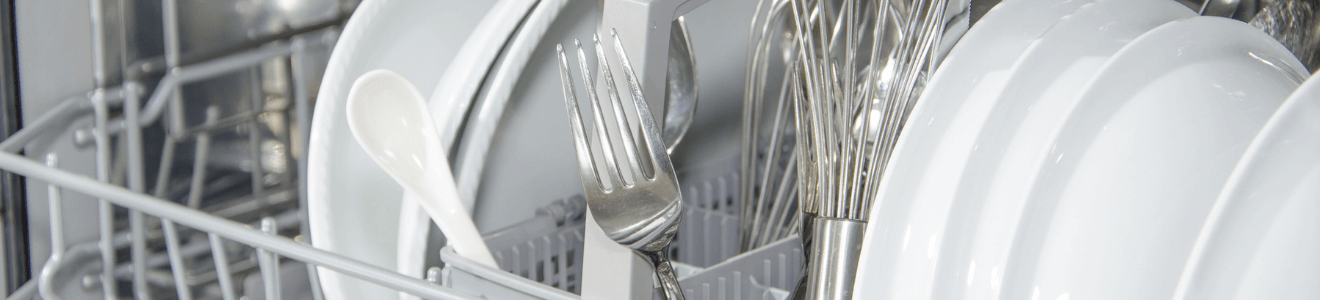 Close up of dishes in a dishwasher